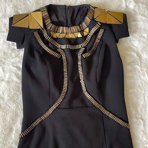 Beautiful asymmetrical dress with gold details, size:4 , never worn!